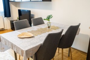 Deluxe appartement | Dineerruimte