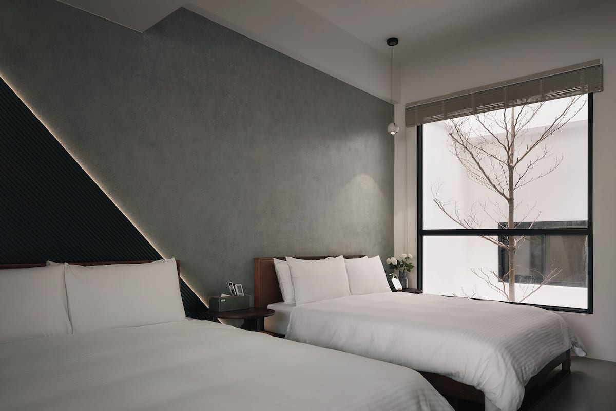 Deluxe Quadruple Room | Down duvets, individually decorated, soundproofing, free WiFi