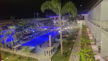 3 outdoor pools, open 8:00 AM to 11:00 AM, pool umbrellas, pool loungers