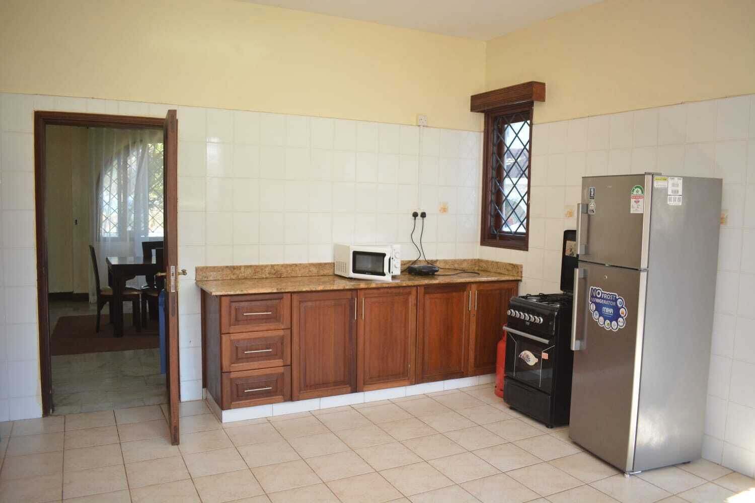 Family Apartment | Private kitchen | Fridge, microwave, cookware/dishes/utensils