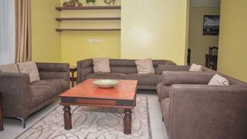 Family Apartment | Living area | 24-inch Smart TV with digital channels