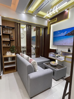 Premium Condo, 2 Bedrooms, Non Smoking, Bay View | Living room | 55-inch Smart TV with digital channels, Netflix, streaming services