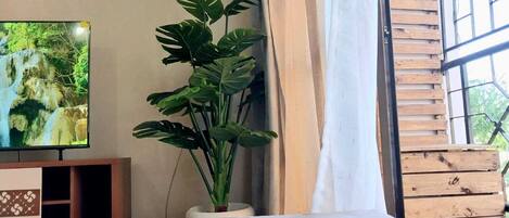 Business Apartment | Living area | 24-inch Smart TV with digital channels