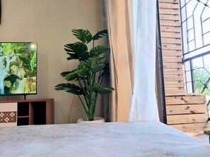 Business Apartment | Living area | 24-inch Smart TV with digital channels - Lux Suites Juniours Apartments Bamburi (Mombasa)