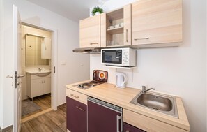 Refrigerador, placa de cocina, cafetera/tetera