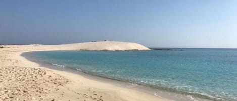 Solstolar och strandhanddukar