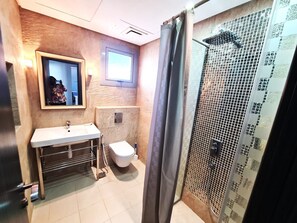 Dutxa, bidet, tovalloles i sabó 