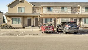 A two-story building with a parking lot.