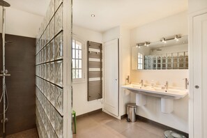 Shower, hair dryer, towels, soap
