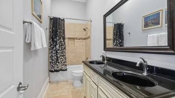 Jetted bath, hair dryer, towels, soap
