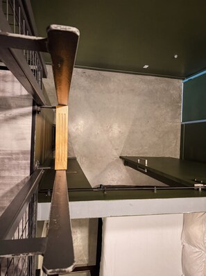 A kitchen with a stainless steel countertop, a wooden handle, and a metal rack. - ⁂Pet Friendly⁂10min-Airport⁂AC⁂Gym⁂2Bed (Santa Ana)