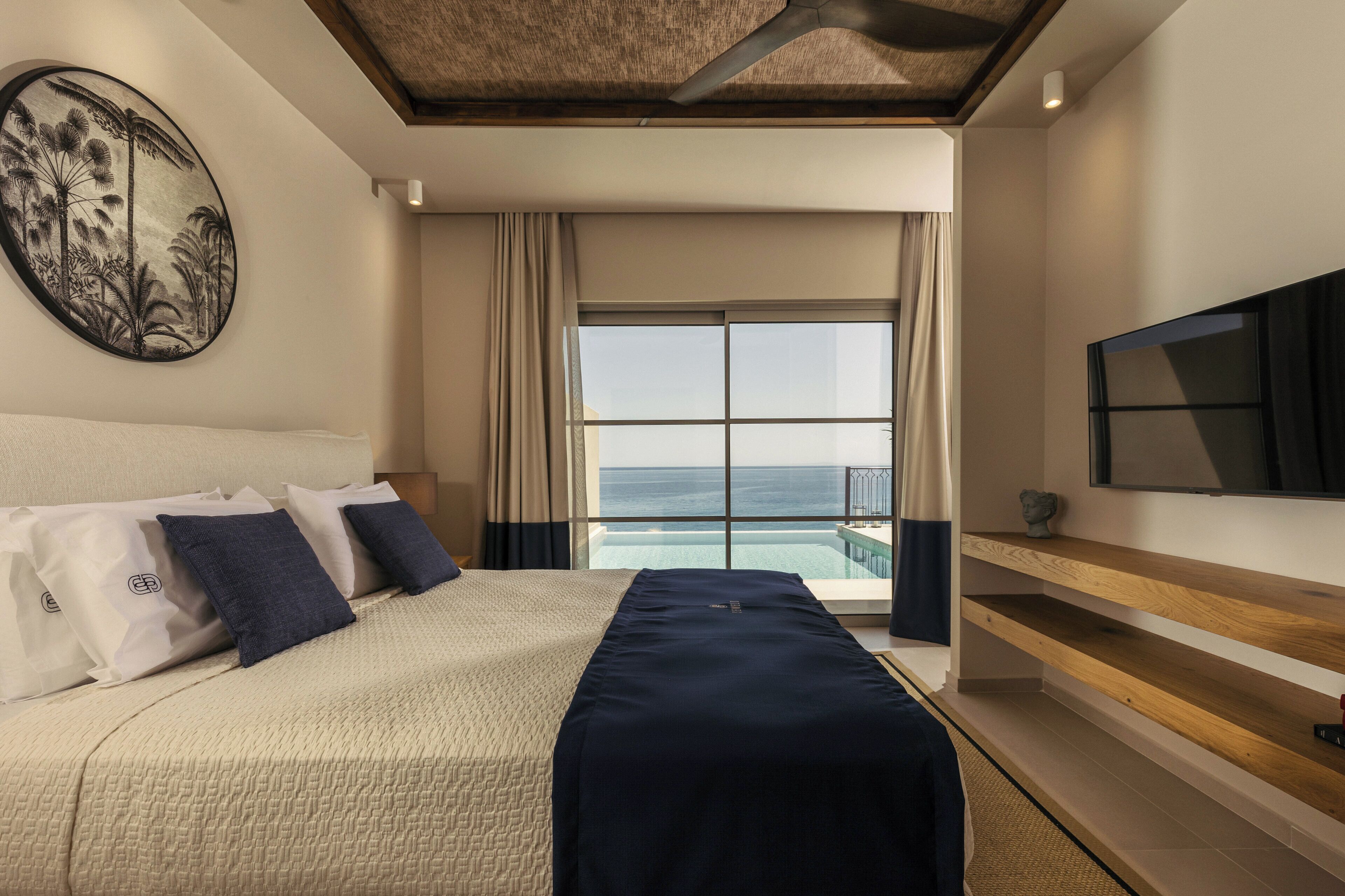 Suíte superluxo, 1 cama King, vista para o mar | 1 quarto, roupas de cama premium, camas com colchões pillow-top