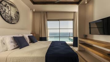 Suíte superluxo, 1 cama King, vista para o mar | 1 quarto, roupas de cama premium, camas com colchões pillow-top