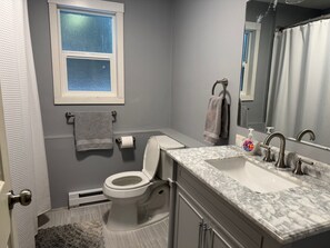 Hair dryer, towels, soap, shampoo