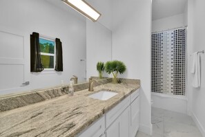 Shower, hair dryer, towels, soap