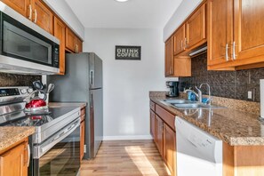 Fridge, microwave, oven, stovetop - Fenton Flats- Suite 2 With On Site Hot Tub and Personal Garage (Fenton Township)