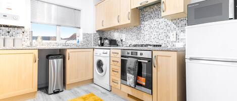 Apartment | Private kitchen | Fridge, microwave, oven, stovetop