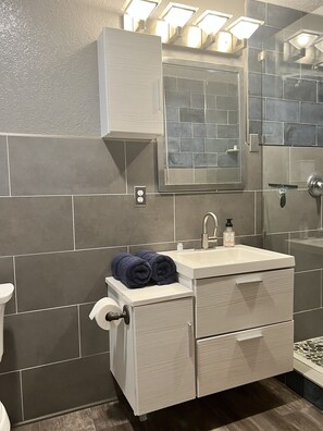 Shower, towels, soap, shampoo