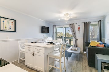 Eat in Kitchen and living room to the Balcony