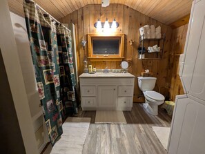 Jetted bath, hair dryer, towels, soap