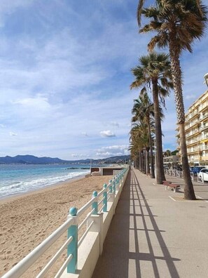On the beach, sun loungers, beach towels