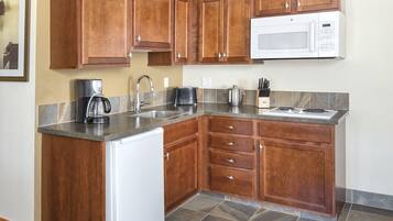 Fridge, microwave, stovetop, coffee/tea maker