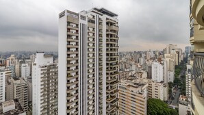 A high-rise residential building with multiple balconies, surrounded by other high-rise buildings in an urban setting. - Ai78-2506 in S o Paulo (São Paulo)