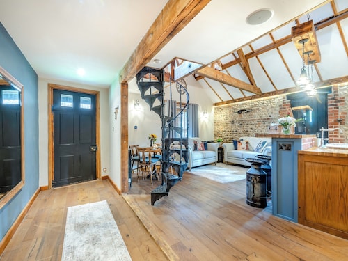 This picture-perfect barn conversion, boasts a private hot tub and sauna.