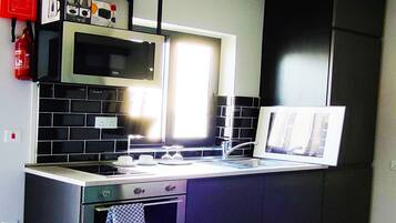 Panoramic-Apartment, 1 Einzelbett, Nichtraucher, Hafenblick | Eigene Küche | Großer Kühlschrank, Mikrowelle, Ofen, Herdplatte