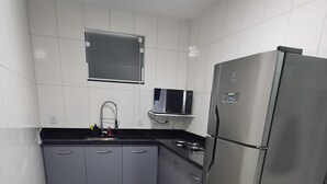 Private kitchen - Studio Completo e Confortável a 300 mts do Shopping (Balneário Angra dos Reis)