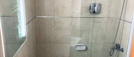 Hair dryer, bidet, towels, soap
