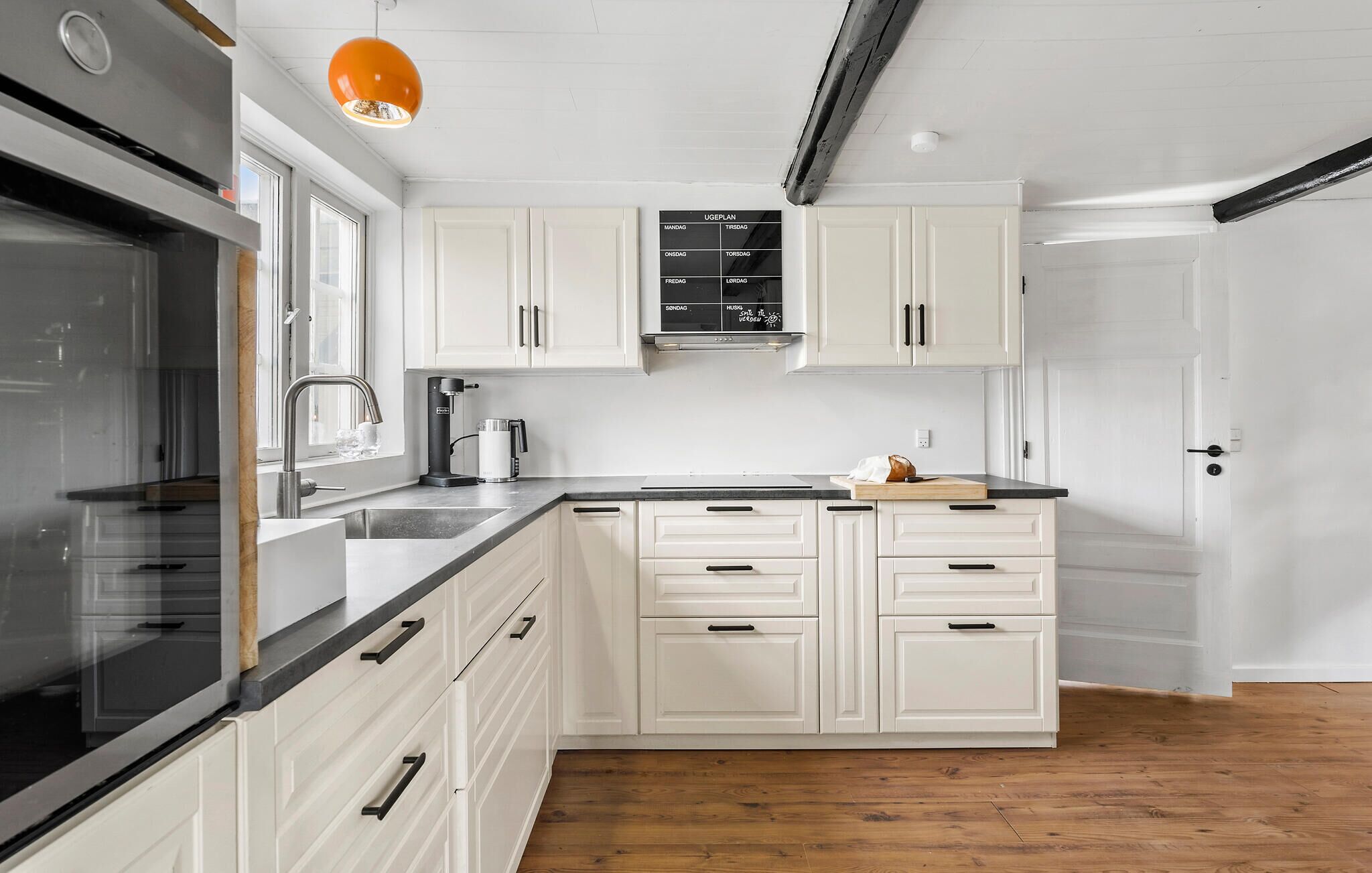 Fridge, stovetop, dishwasher, coffee/tea maker