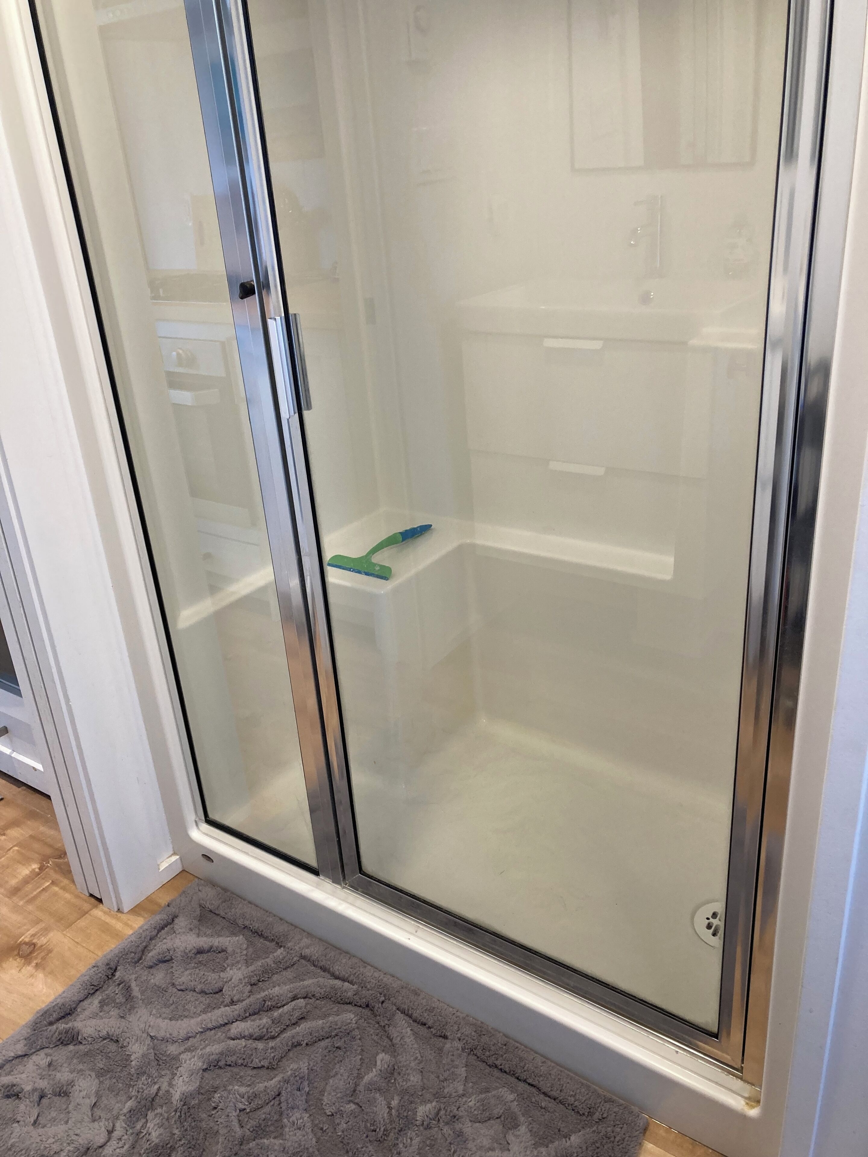 Shower, hair dryer, towels, toilet paper