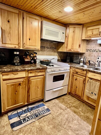 Remodeled cozy retreat with a lake front view on Devils Lake. Pet Friendly! 