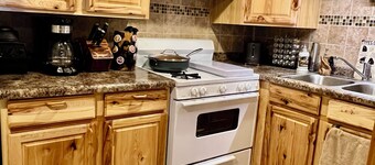 Remodeled cozy retreat with a lake front view on Devils Lake. Pet Friendly!