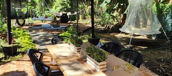 Rustic Cottage Style w/ Relaxing Suspended Hangout Pods! Tranquil water sounds.