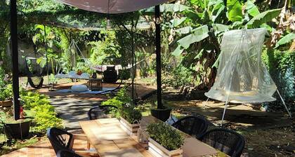 Rustic Cottage Style w/ Relaxing Suspended Hangout Pods! Tranquil water sounds.