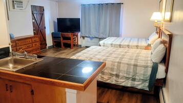 Desk, laptop workspace, free WiFi, bed sheets