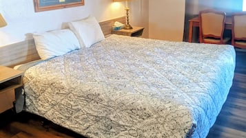 Desk, laptop workspace, free WiFi, bed sheets