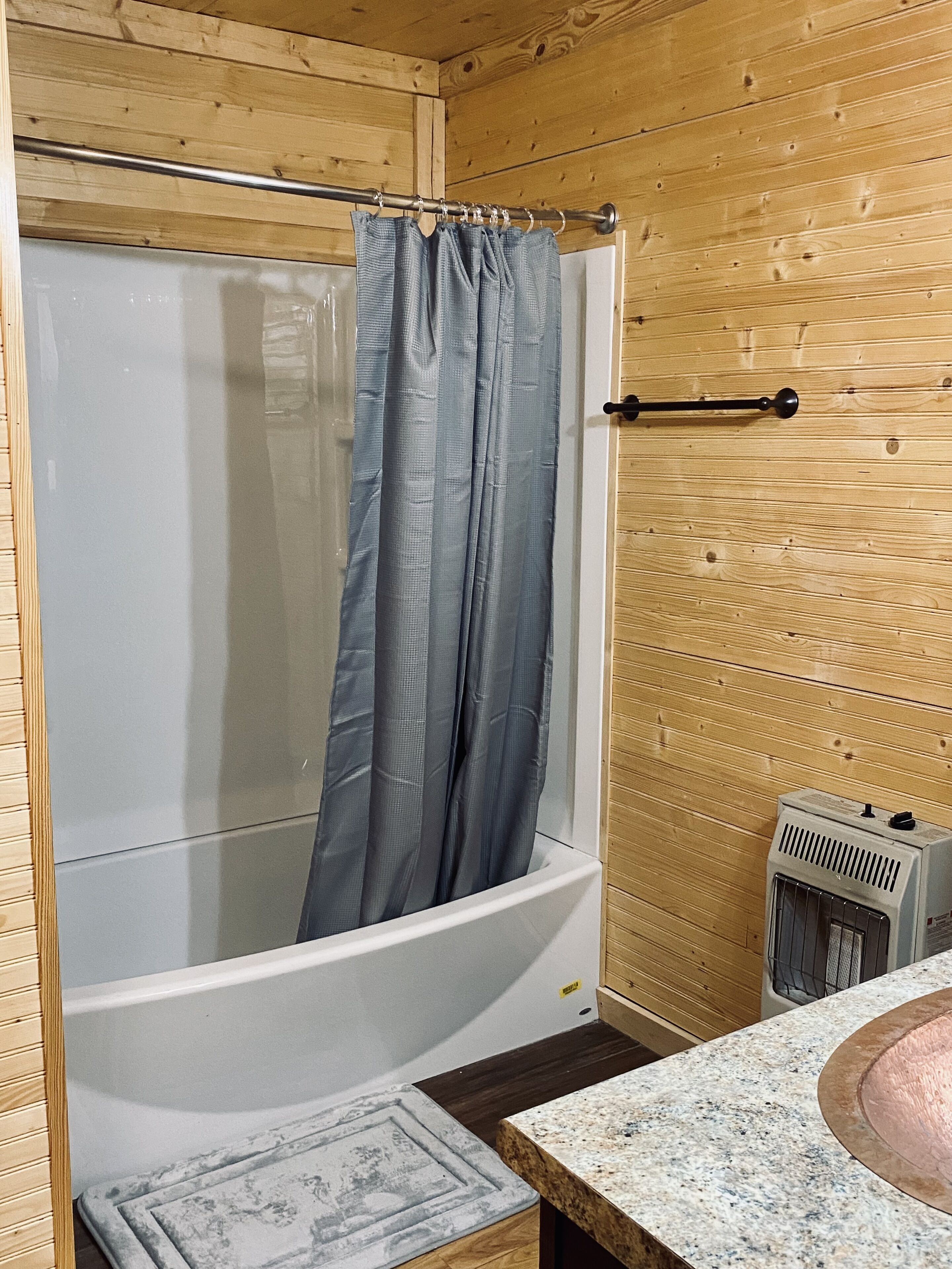 Shower, hair dryer, towels, toilet paper