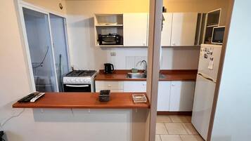 Fridge, microwave, oven, electric kettle