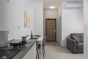 Standard Apartment, Multiple Bedrooms, Sea Facing (Apartment Green Zone) | Living area | 21-inch Smart TV with satellite channels - Seafront Villa Andrijana (Krsan)