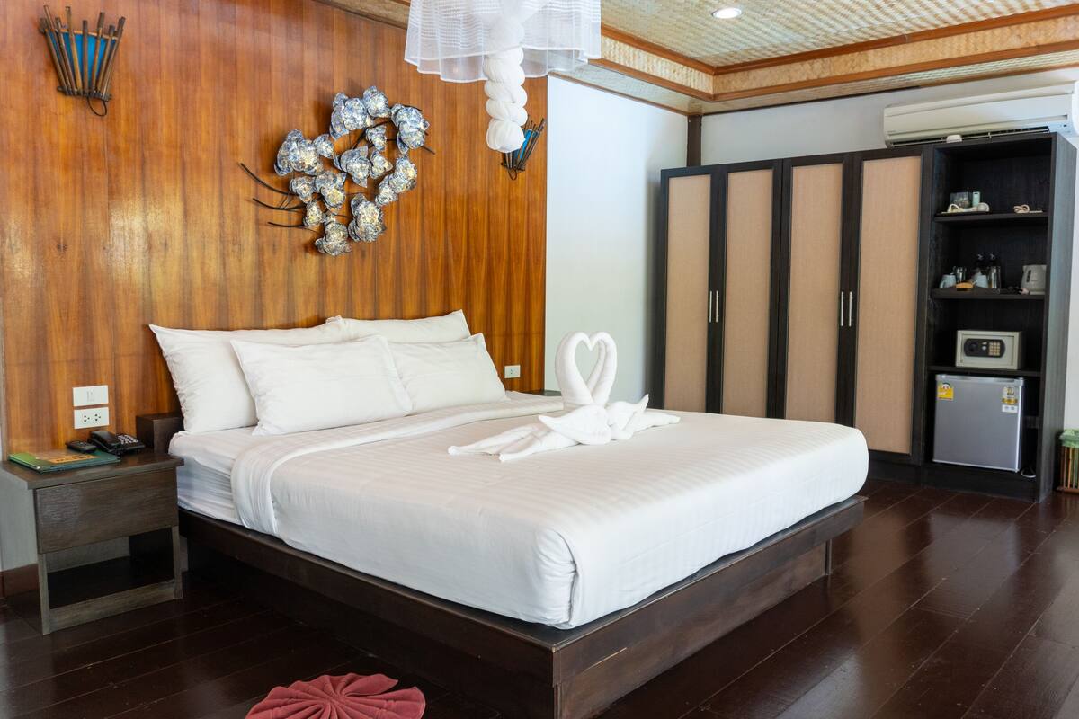 Superior kamer | Een kluis op de kamer, verduisterende gordijnen, gratis babybedden