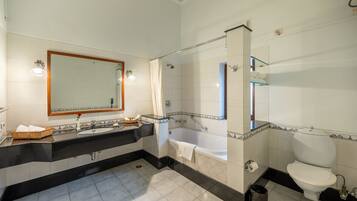 Premium Room | Bathroom | Shower, slippers, towels, soap