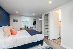 1 bedroom, desk, iron/ironing board, travel cot