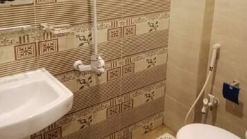 Deluxe Double Room | Bathroom | Slippers