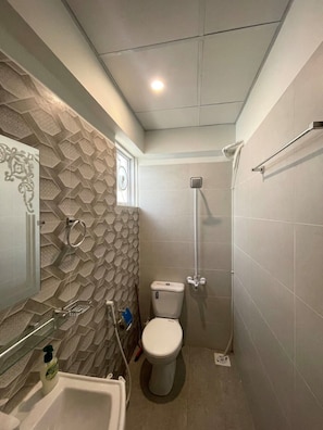 Habitación individual Deluxe | Baño | Zapatillas