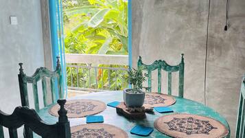 Soul Villa | Living area | 32-inch TV with cable channels, tablet, pay movies