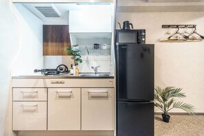 Triple Room | Private kitchen | Fridge, microwave, stovetop, electric kettle - Apartment Hotel 11 Shinsaibashi II (Osaka)