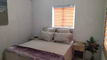 Economy Double Room | Blackout curtains, iron/ironing board, free WiFi, bed sheets
